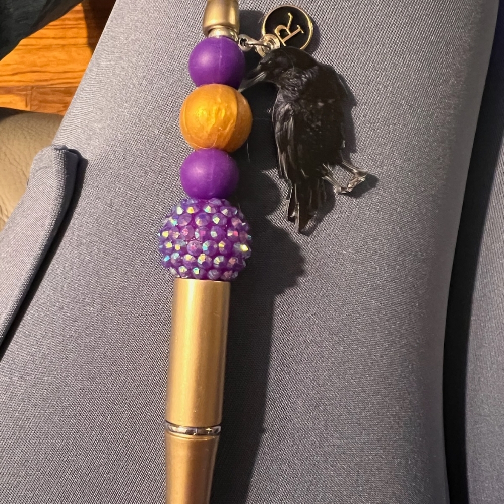 Purple and Gold Beaded Pen with Black Raven Charm